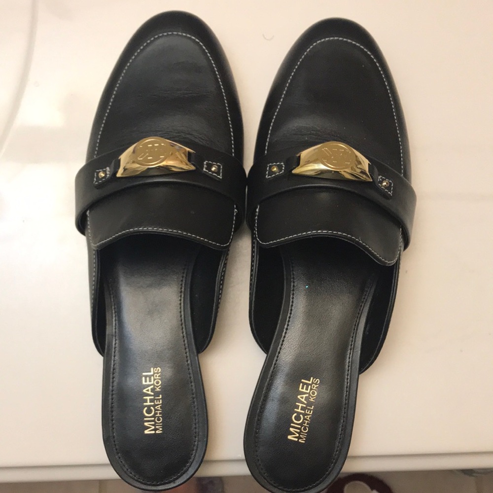 Michael Kors mules.